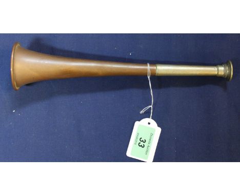 A copper hunting horn by Andrews Oxford