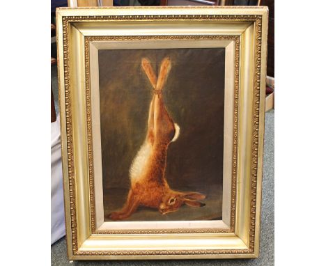 R Hutchinson oil on canvas of a hung hare, signed lower right, 23" x 16", mounted within period gilt frame