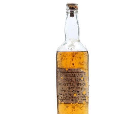 1916 ALLMAN’S PURE IRISH POT STILL WHISKEY40 Under Proof (34%abv), fill level to shoulder, with driven cork showing visible s