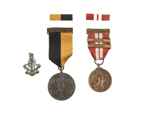A WAR OF INDEPENDENCE MEDAL, with black and tan ribbon and clasp bar, together with an Emergency Services medal, with ribbon,