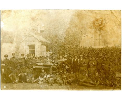 THE BLACKSMITH OF BALLINALEEAn original photographic print circa 4 ins x 6 ins showing a large group of uniformed Free State 