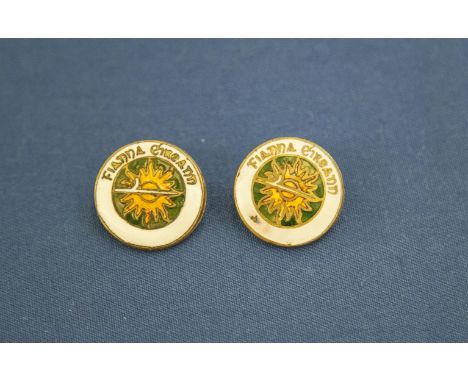 TWO NA FIANNA EIREANN ENAMEL BADGES, in green, white and orange, with Rising Sun device, each approx. 2.2cm diameter