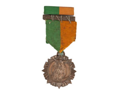 1916 RISING SERVICE MEDAL, with additional flash on stick pin. Recipient unknown. A rare and much sought after medal.