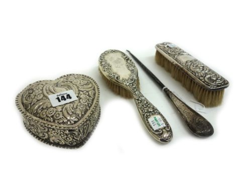 A Victorian silver heart shape jewel box, Nathan & Hayes, Birmingham 1893, the hinged cover and sides, foliate embossed and w