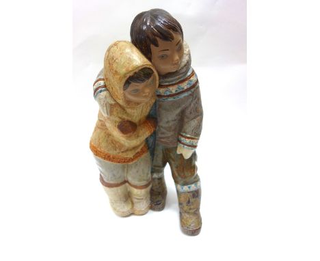 A large Lladro figure of two children, 40cm high.