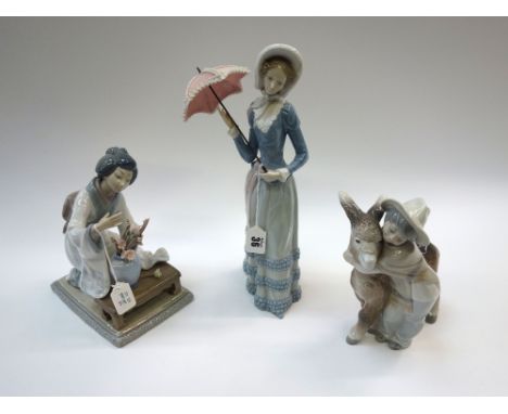 Three Lladro porcelain figures, a lady with a parasol, a Japanese lady arranging a vase of flowers and a girl with a mule (3)