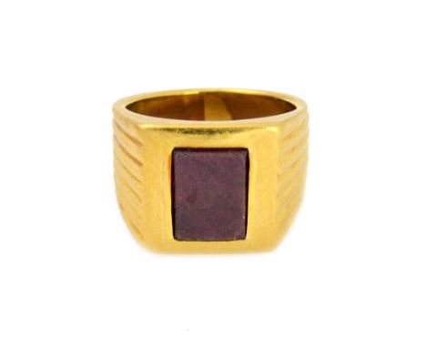An 18ct yellow gold and ruby tablet signet ring by Kutchinsky, London 1958, size V, 26.5 g gross.