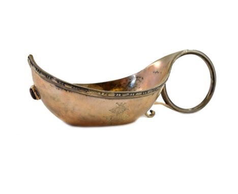A Russian silver Kovsh, post 1908, with bead and dart rim and a large circular ring handle, set with an oval cabochon garnet,