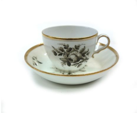 A Spode part tea and coffee service, circa 1800, painted en grisaille with flowers, heightened and banded in gilt, with paint