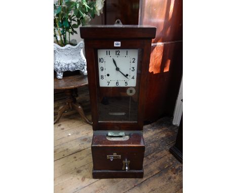 National Time Recorder Co Ltd:  a mahogany cased time clock, 98.5cm high, labelled on the reverse and dated '1957', with key.