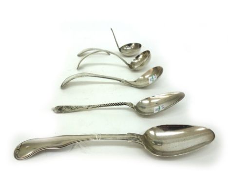A collection of five Dutch silver spoons and sauce ladles, 19th century, various dates and makers, including a serving spoon 