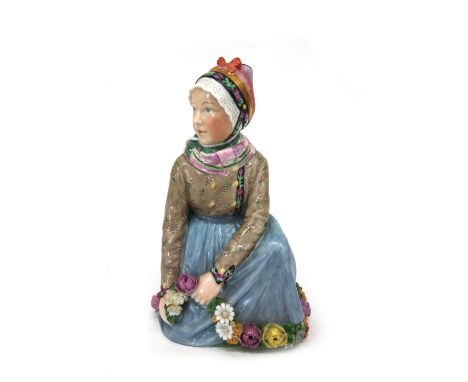 A Royal Copenhagen figure Faroe girl, model number 12413, 15cm high.