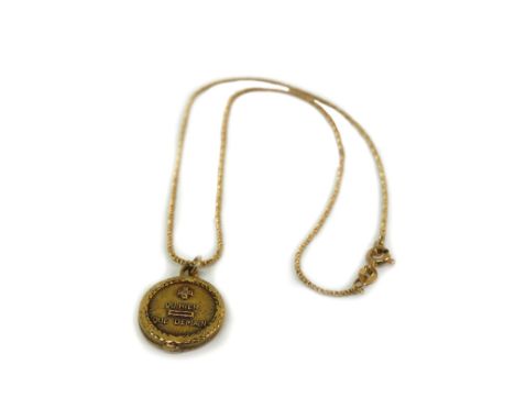 A gold, diamond and ruby pendant on an 18ct yellow gold rope twist link neck chain, 8.5g gross.