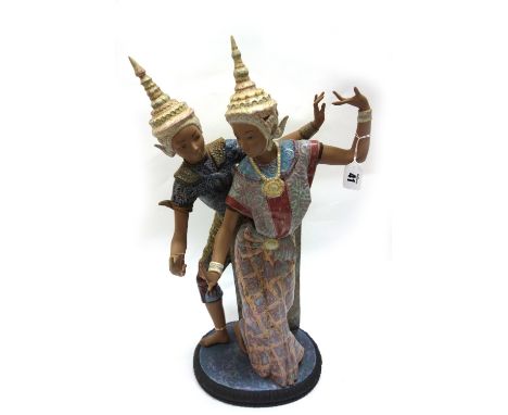 A large Lladro figure group of two Thai dancers, 50cm high.