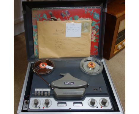 A Revux G36 spool to spool recorder with lift top cover.