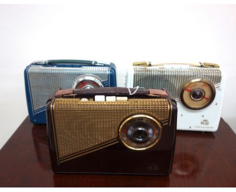 KB Rhapsody portable transistor radio in burgendy plastic case, AKB Rhapsody starlight radio in blue case and another model g