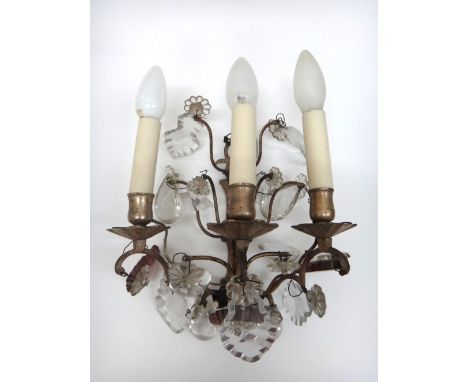 A pair of Italian silvered metal and glass twin branch wall appliques, early 20th century, hung with clear and amethyst colou
