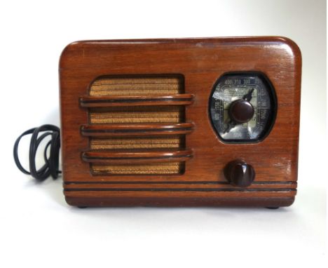 A Wards airline radio model 93BR 421B in cream case, 18cm, and an Emerson and USA Midget type valve radio in walnut finish ca