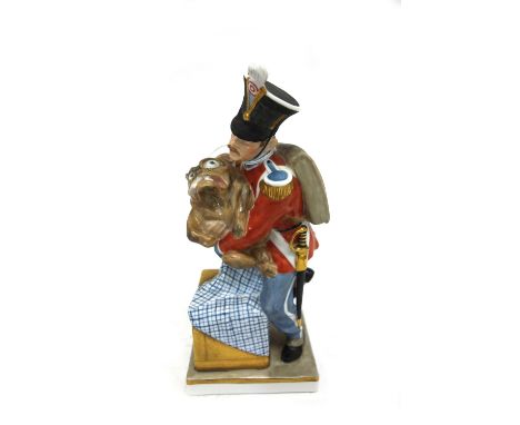 A Royal Copenhagen figure Hussar holding Griffon dog, model number 1156, 18cm high.