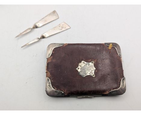 A Victorian leather and silver mounted purse A/F together with two 2000 Millennium London sterling silver letter openers with