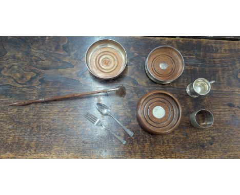 Mixed silver items to include a candle snuffer with flame finel, silver/silver inlaid wine coasters one A/f and a miniature m