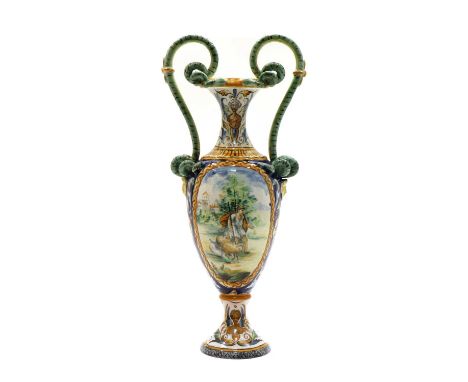 A Cantagalli type maiolica urn vase, late 19th/early 20th century, with snake handles and decirated with figures to the reser