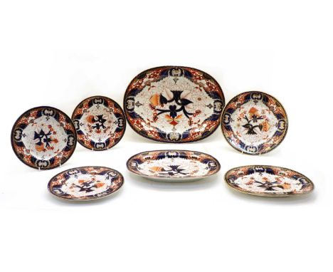 A Chamberlain's Worcester porcelain part dinner service, comprising: plates - 14 x 25.5cm, 1 x 31.5cm; 3 oval serving plates: