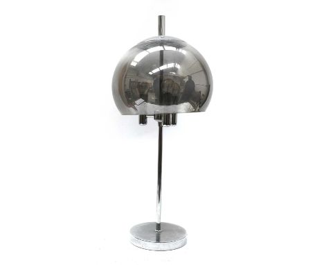 A chrome table lamp, in the Guzzini style, with a smoked glass adjustable shade, with three lights, 77cm highCondition report