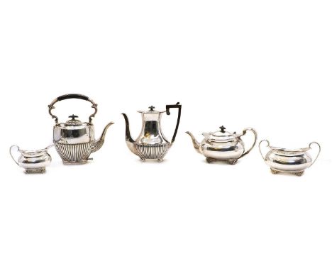 A collection of silver plated items, to include a pair of three branch candelabra and various teawares, the candelabra 25cm h