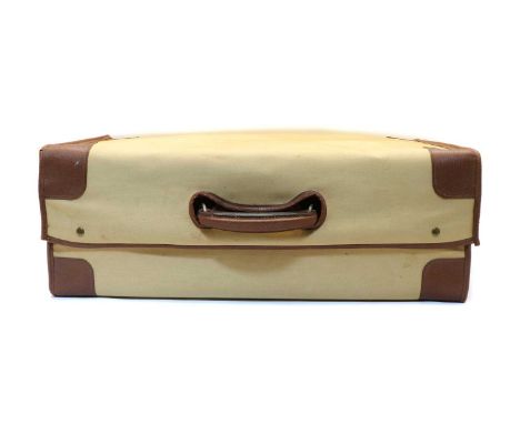 A good George V gentleman's travelling dressing case, in ostrich leather, with its complete range of fittings in glass, ivory