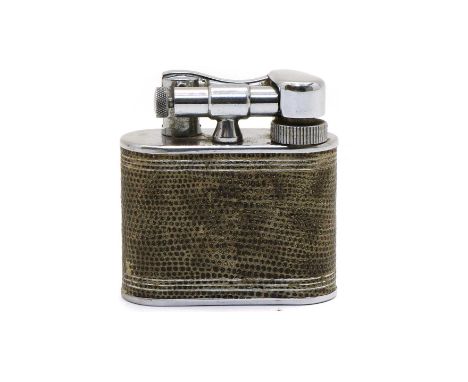 A Cyclops table lighter, with a shagreen effect body and chromed fitments, 7cm highCondition report: The fitments with some l