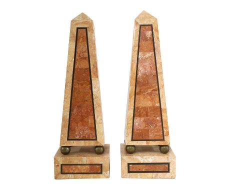 A pair of modern marble veneered obelisks, raised on ball supports and a square plinth base, 13.5cm wide, 13.5cm deep, 42cm h