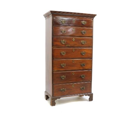 A George III mahogany tallboy, the moulded cornice, over a Greek key frieze, over seven graduated drawers, on shaped bracket 