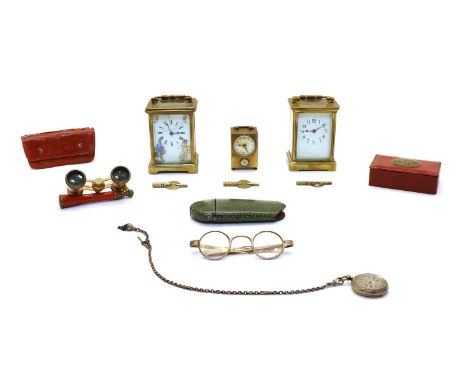 A  French brass carriage clock, early 20th century, with enamelled panels, depicting printed figures, 14.5cm high, a similar 