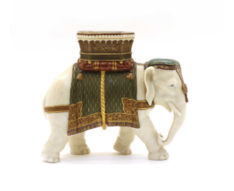 A Hadley's Worcester porcelain Elephant, with ceremonial howdah and regalia, impressed marks, 21cm wide, 9cm deep, 19cm highC