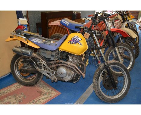 A Honda SLR 650 motorcycle Registration no. R773 KDD. The 644 cc, electric start four-stroke, single cylinder, air cooled eng