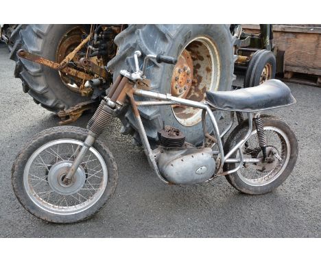 A BSA A65? motorcycle rolling chassis with an incomplete twin-cylinder, four-stroke, air cooled engine No. A65DC 4995, a pair