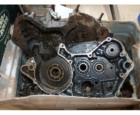 A Suzuki engine/gearbox components engine no. JT02 - 106861. Dismantled.