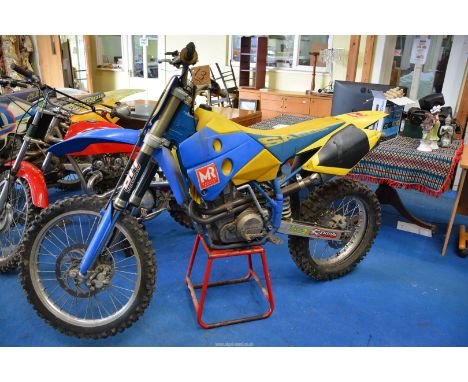 A 2001 Husaberg 600cc motocross motorcycle having a four-stroke, single cylinder, water cooled engine No. 1124203. Runs. N.B.