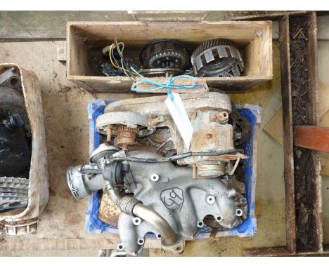 A toolbox, clutch parts, a JAP engine drive housing with BTH single cylinder magneto, a car 4 cylinder intake manifold, etc.,