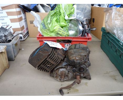 A Yamaha 100 cc engine , no. 3V6/012092 and a box of carburettors, a headlamp, etc.,