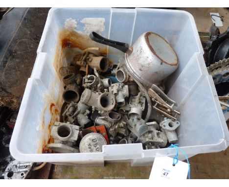 A box of carburettors, a DBD 500 piston, etc.,