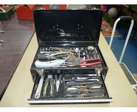 A steel motorcycle event tool-chest and a good quantity and range of tools including 3/8'' drive sockets, combination spanner