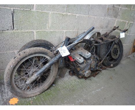 A Honda motorcycle frame and twin overhead camshaft, four-stroke, four cylinder, air cooled, engine believed 750 cc 16 valve,