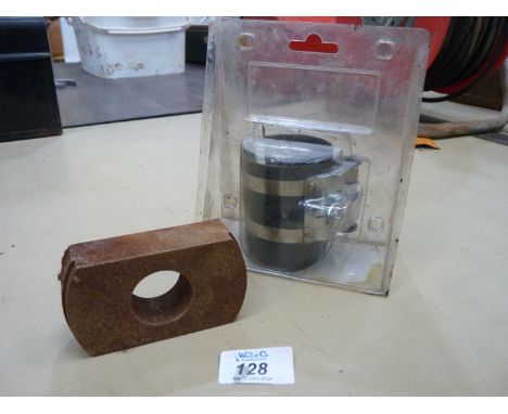 A piston ring insertion clamp and cylinder liner fitting dolly.