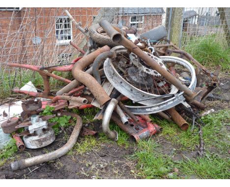 A quantity of scrap motorcycle parts, an Atco two-stroke mower engine (seized), chains, etc.,