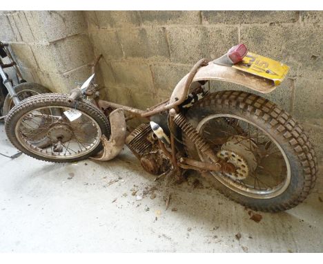 A motorcycle frame with a two-stroke, single cylinder air-cooled engine, etc, frame and engine No. 498-601574, appears to hav