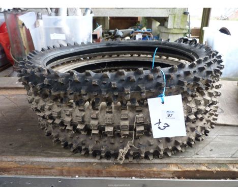 Three unused 80/100 x 21" aggressive tread pattern tyres, (two of Bridgestone/one of Pirelli).