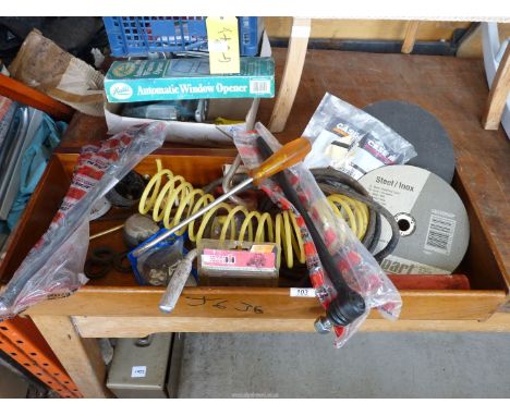 A drawer containing a pair of Case tractor track-rod ends (new), a brass ball valve, steel cutting discs, a speed brace, a sc