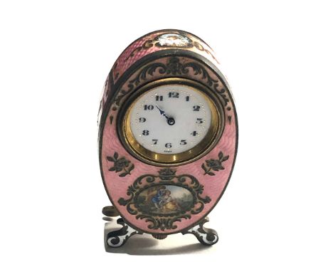 19th century pink guilloche enamel boudoir desk clock with cherub panels and Watteauesque panel of lovers to front of case th